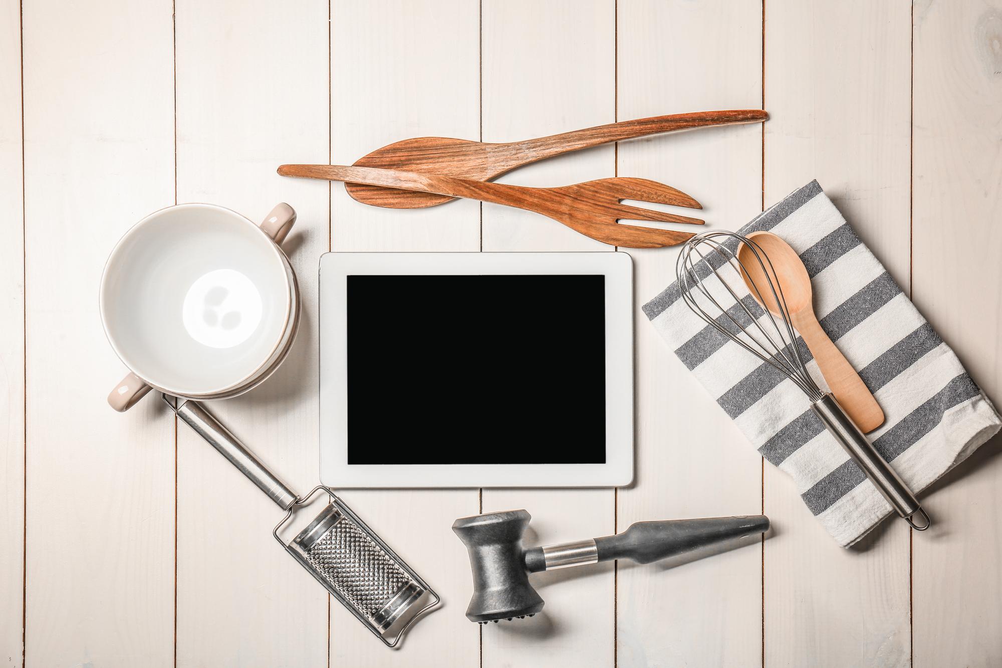 Studio kitchen workspace with utensils and tablet